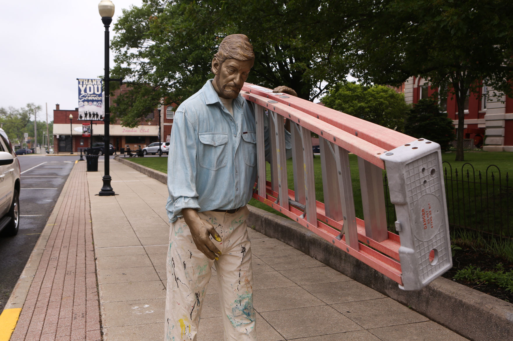 Artist Seward Johnson's "The Tooth" is implanted at the Crown Point Sportsplex